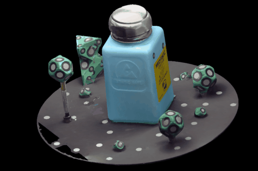 Animated orbit around a 3D scanned isopropyl alcohol bottle surrounded by scanning markers, rendered with realistic textures captured by the 3D scanner